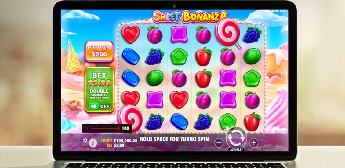 Slot Sweet Bonanza na ekranie notebooka